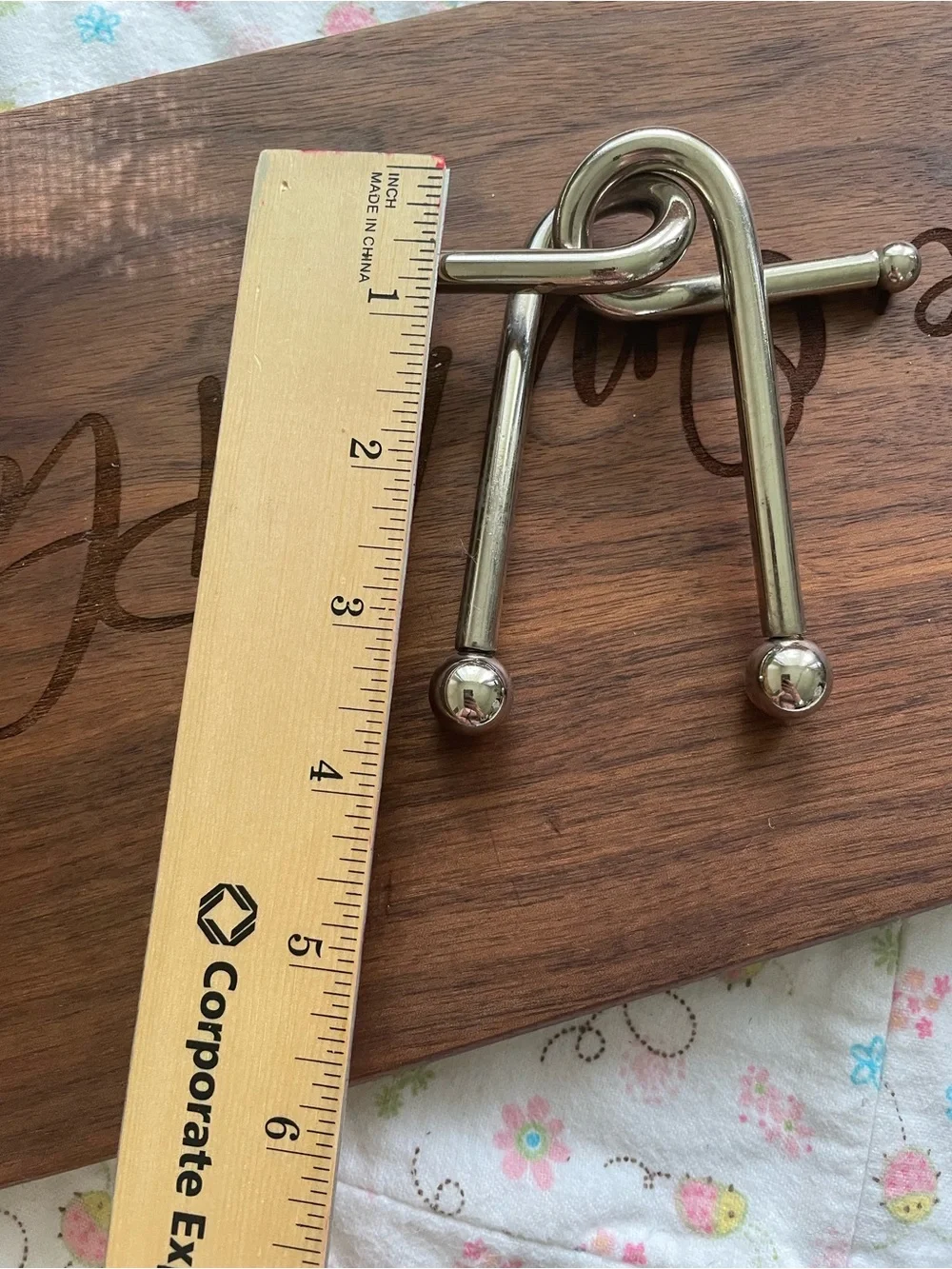 Silver metal puzzle with a unique design